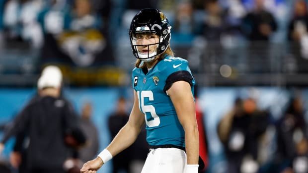 JACKSONVILLE, FLORIDA - JANUARY 14: Trevor Lawrence #16 of the Jacksonville Jaguars warms up prior to a game against the Los Angeles Chargers in the AFC Wild Card playoff game at TIAA Bank Field on January 14, 2023 in Jacksonville, Florida. (Photo by Douglas P. DeFelice/Getty Images)