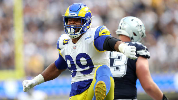 Aaron Donald of the Los Angeles Rams reacts after making a sack.