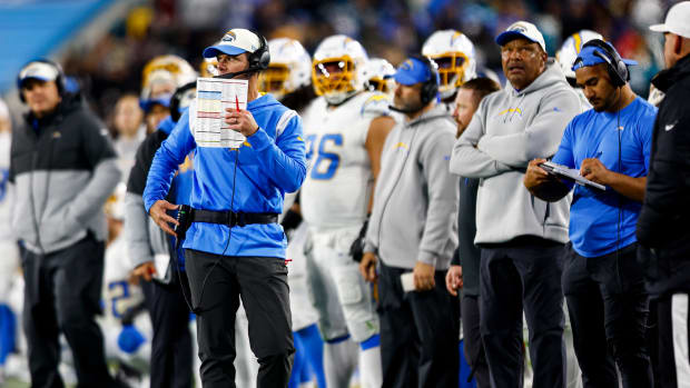 JACKSONVILLE, FL - JANUARY 14: Head coach Brandon Staley of the Los Angeles Chargers coaches from the sidelines during the second quarter of an NFL wild card playoff football game against the Jacksonville Jaguars at TIAA Bank Field on January 14, 2023 in Jacksonville, Florida. (Photo by Kevin Sabitus/Getty Images)