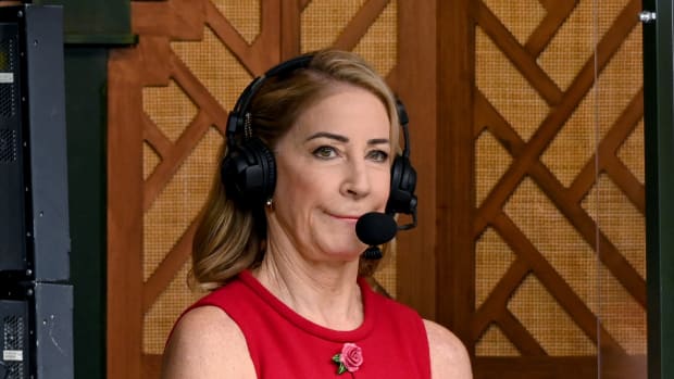 Chris Evert in the announcing booth at Wimbledon.